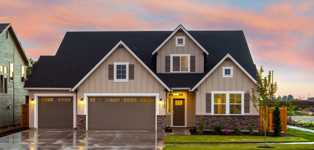Charming family home in Boise, ID with a modern facade and spacious garage.