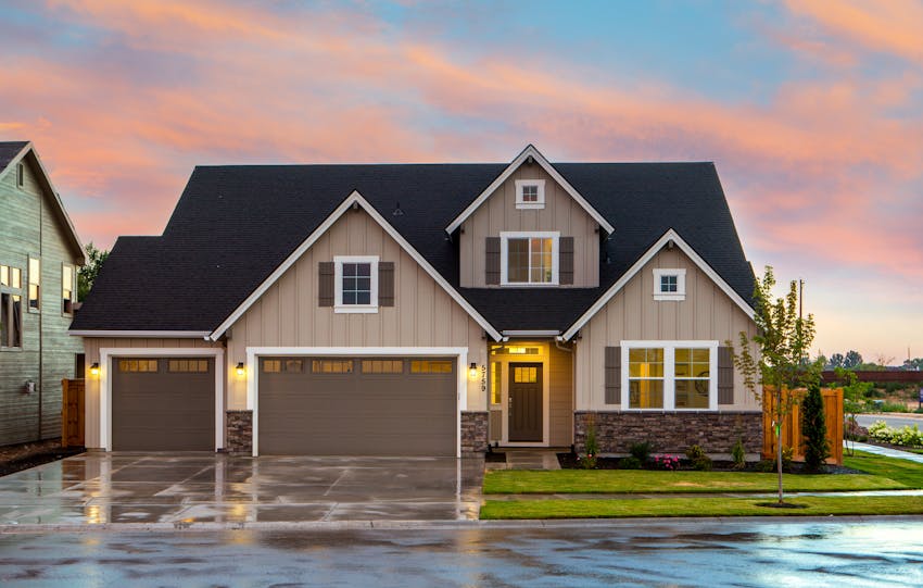 Charming family home in Boise, ID with a modern facade and spacious garage.