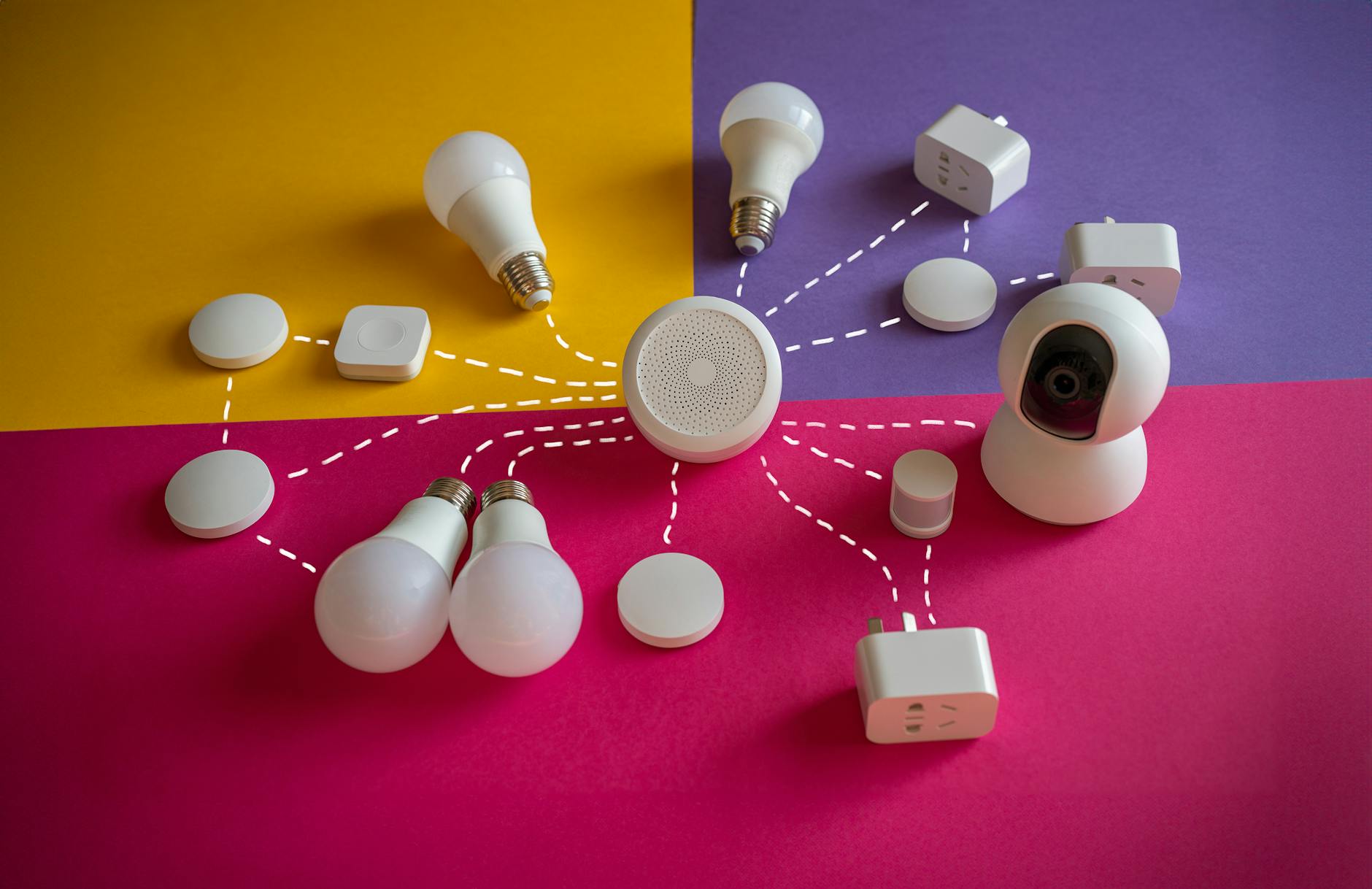 camera and electric bulbs on colorful background