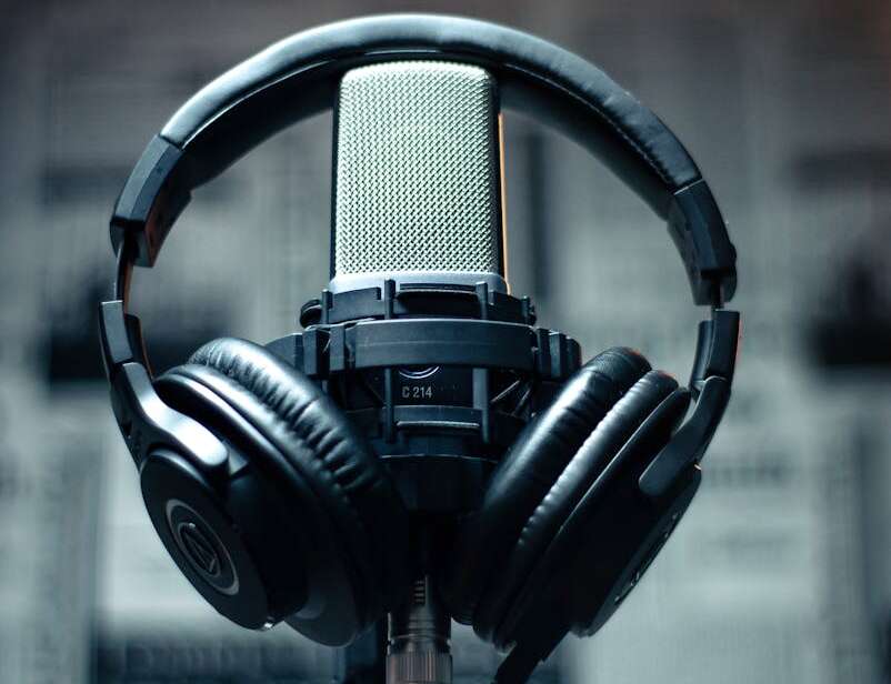black headset on condenser microphone