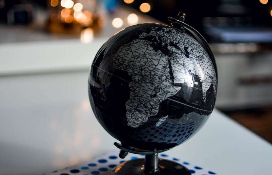 black and gray desk globe